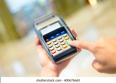 Customer Finger Press The Button On The Pos Machine