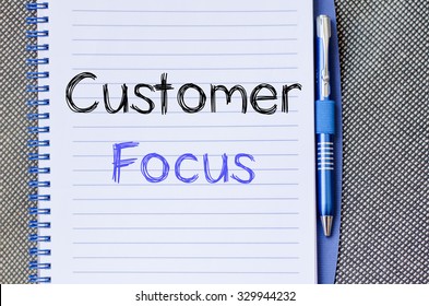 Customer focus text concept write on notebook