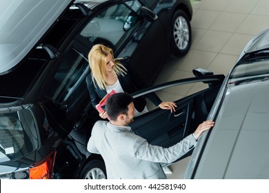 Customer Looking Car Dealership Customizing Vehicle Stock Photo 