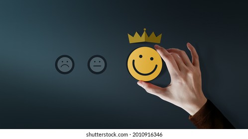 Customer Loyalty Concept. Client Experiences. Happy Customer giving Positive Services Rating for Satisfaction present by Smiling Face and Crown - Shutterstock ID 2010916346