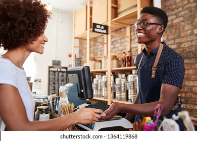 Customer Making Contactless Payment For Shopping At Checkout Of Grocery Store Using Mobile Phone