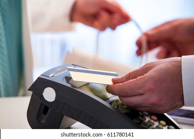 Customer Paying With Contactless Card. NFC Technology Payment In Store. Close Up. Shopping In Pharmacy.