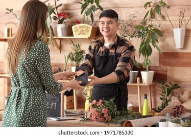 Customer Paying For Order In Flower Shop