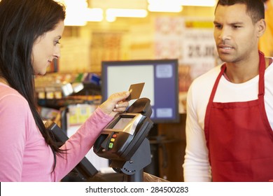 308 Hispanic cashier Images, Stock Photos & Vectors | Shutterstock