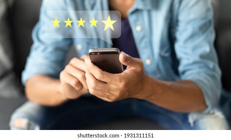 Customer Pressing On Smartphone With Five Star Icon For Feedback Review Satisfaction Service