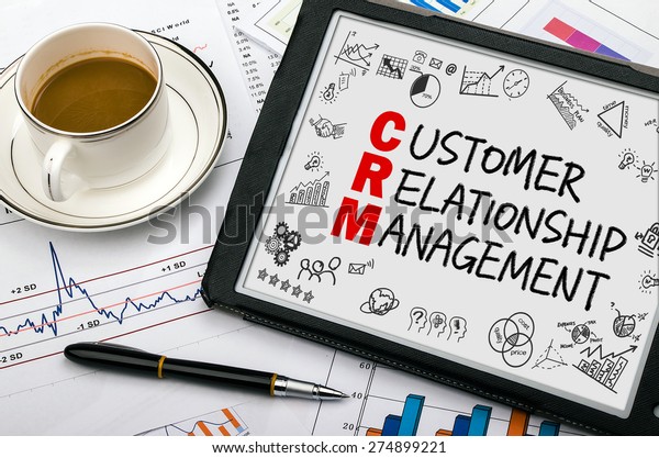 customer relationship management concept handwritten\
on tablet pc