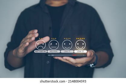 Customer Review Good Rating Concept, People Use Smartphone And Choose Smile Face Icon And Five Star Item On Visual Screen For Positive Customer Feedback, Testimonial And Testimony