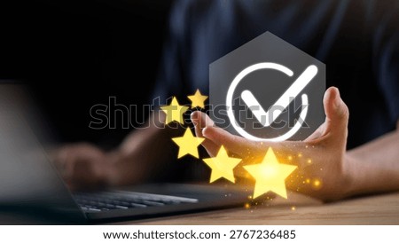 Customer satisfaction concept with glowing approval check mark, five star rating, and laptop workspace. Represents service excellence, positive review system, trust assurance, quality management.
