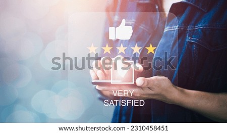 Customer satisfaction Concept, Mobile technology plays in empowering customers to express their opinions and responding to customer reviews to enhance their products, services and customer experience