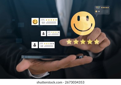 Customer satisfaction feedback with five star rating system, hand hold smartphone with digital smiley face quality service review, business evaluation, client experience, online review management