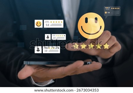 Customer satisfaction feedback with five star rating system, hand hold smartphone with digital smiley face quality service review, business evaluation, client experience, online review management