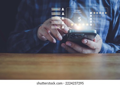 Customer satisfaction survey concept Users rate the service experience on the online application. Customers can assess the quality of service leading to a business reputation rating.