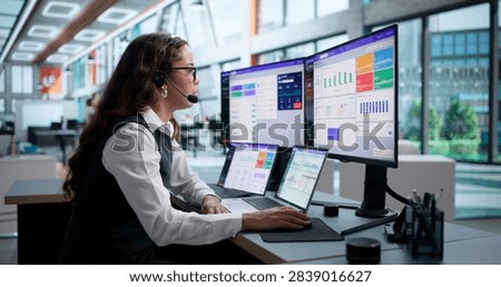 Customer Service Agent Using Computer To Manage Inbound Customer Calls Efficiently.
