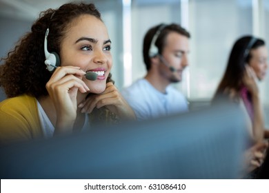 Customer service executive working at office - Shutterstock ID 631086410