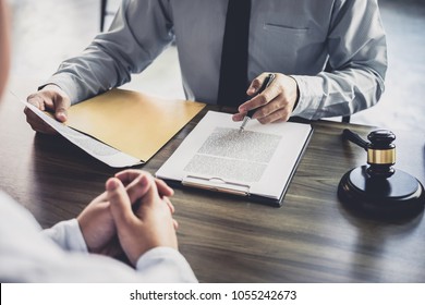 Customer service good cooperation, Consultation between a Businessman and Male lawyer or judge consult having team meeting with client, Law and Legal services concept. - Shutterstock ID 1055242673