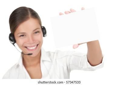 Customer Service Representative With Headset Holding A Blank Empty Card. Isolated On White Background.