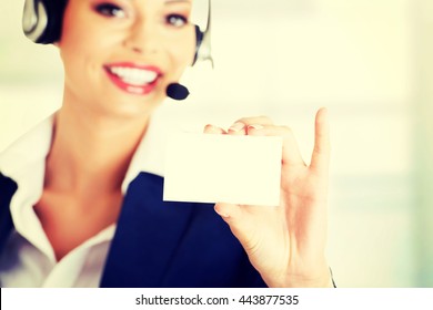 Customer Service Representative Holding A Blank Card.