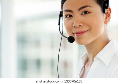 Customer Service Representative - Portrait Of Asian Call Center Operator