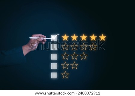 Customer service and Satisfaction concept, Business man Write a check mark in the square virtual screen on the happy Smiley face icon to give satisfaction in service. rating very impressed, 5 star.