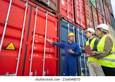 Customer Service Staff Explain About Container Spec To His Customer At Inside Of Container Cabinet In Shipping Company