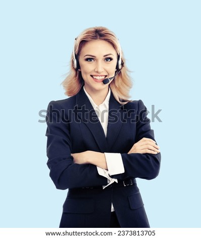 Customer support, advisor phone operator in headset, crossed arms, folded hands pose, isolated bright sky blue background. Consulting and assistance service call center. Answering help, advertising.