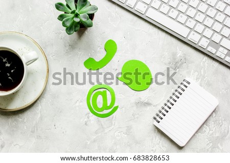 customer support company office with contact us sign and coffee top view mockup