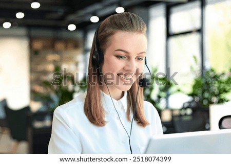 Customer support operator working in a call center office