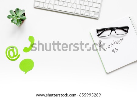 customer support service desktop with contact us signs on white background top view mock-up