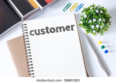 customer, Text message on white paper book on white desk / business concept - Shutterstock ID 388891801