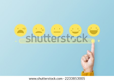 Customer touching loading bar for rating feedback scale. Loading giving smile emoticon. Service rating, feedback, satisfaction concept