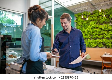 Customer Use Mobile Phone Scanning QR Code For Pay In Cafe, Customer Paying With Qr Code On Smartphone.