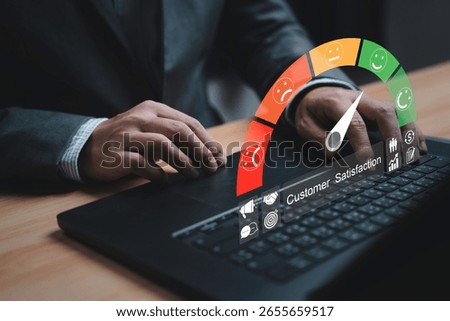 Customer using computer laptop with evaluation indicator rating since low to high and smiley face for client customer satisfaction after use product and service  concept.