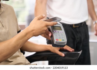 Customer using contactless online way to pay for services