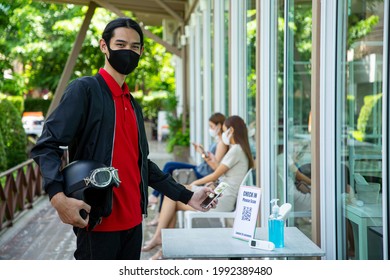 Customer Using Mobile Phone For Scan Check In Before Entry Restaurant.Prevent ,check And Clean Before Go To Order Food.Clean With Alcohol 