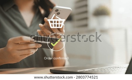 Customer using smartphone and credit card for Buy Now Pay Later checkout with instant order confirmation, highlighting flexible digital payments and e-commerce convenience.