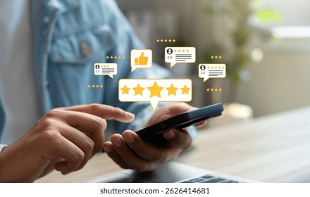 Customer using smartphone to provide five star product review with thumb up icon.Online feedback and satisfaction survey reflect service quality,Building trust,Improving digital brand reputation