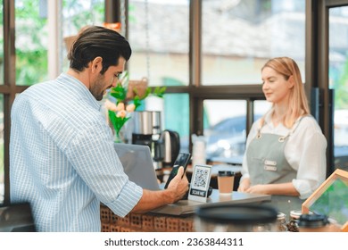 Customer using smartphone to scan QR code for order menu in cafe restaurant with digital delivery, Choose menu and order accumulate discount, E wallet technology to pay online, credit card or bank app