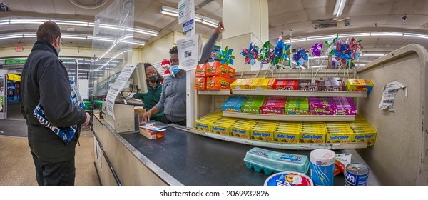 Customer In Winter Coats In A Line  To The Cashier Checkout In A Dollar Tree Store, Holiday Shopping, Super-wide-angle, New York, Bronx, Bay Plaza, United States Of America, 11.05.2021