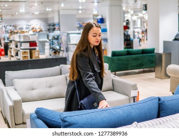 Customer Woman Buying New Furniture - Sofa Or Couch In A Store Supermarket Mall Store