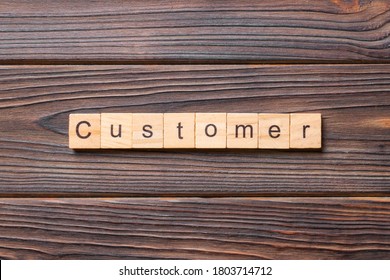 Customer Word Written On Wood Block. Customer Text On Table, Concept.