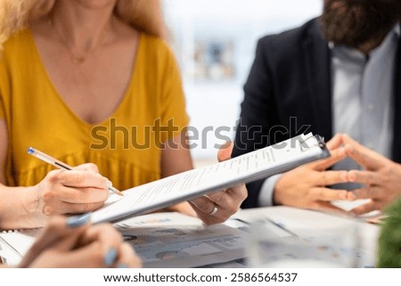 Customers completing paperwork, taking loan from economic agent, finishing lucrative deal. Parent and gen Z girl signing contract, entering agreement with financial consultant