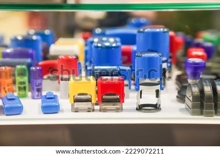 Customized self inking rubber stamps reinvent themselves after every stamp, allowing you to increase productivity for the date or text pad. It’s for sales in a stationary shop.