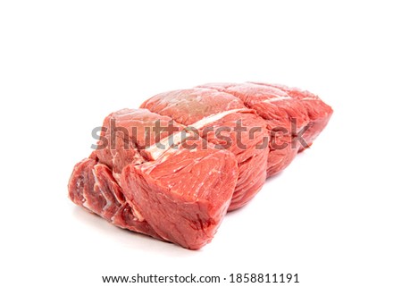 A cut of beef sirloin tip roast isolated on white