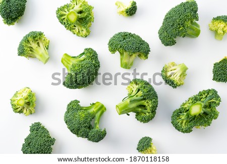 Cut broccoli placed on a white background. View from directly above. Broccoli Background
