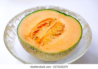 Cut Cantaloupe And White Background