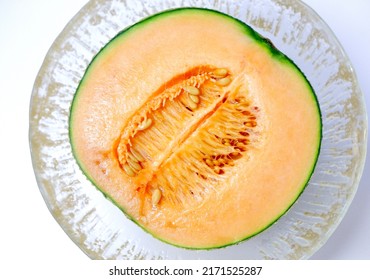 Cut Cantaloupe And White Background