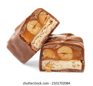 Cut Chocolate Bar With Caramel, Nuts And Nougat Isolated On White