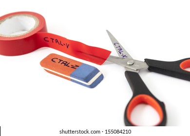 Cut, Copy, Undo With A Scissor, An Insulating Tape And An Eraser