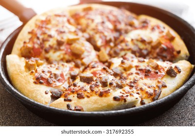 Cut Delicious Pizza In A Pan