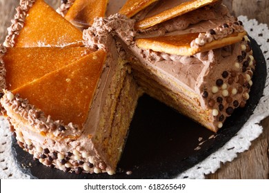 Cut Dobos cake close-up on the table. horizontal
